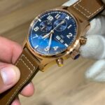 50MA zf 44mm,lpp, caixa de ouro amarelo,fundo azul, pulseira de couro marrom ,eta-a7750 (4)